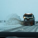 Snow plow truck at work in winter — snow removal marketing playbook