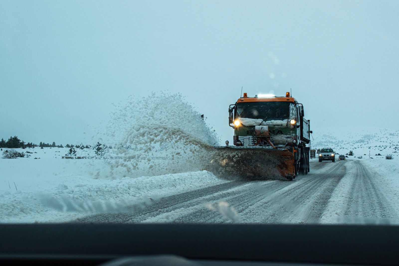 Snow plow truck at work in winter — snow removal marketing playbook